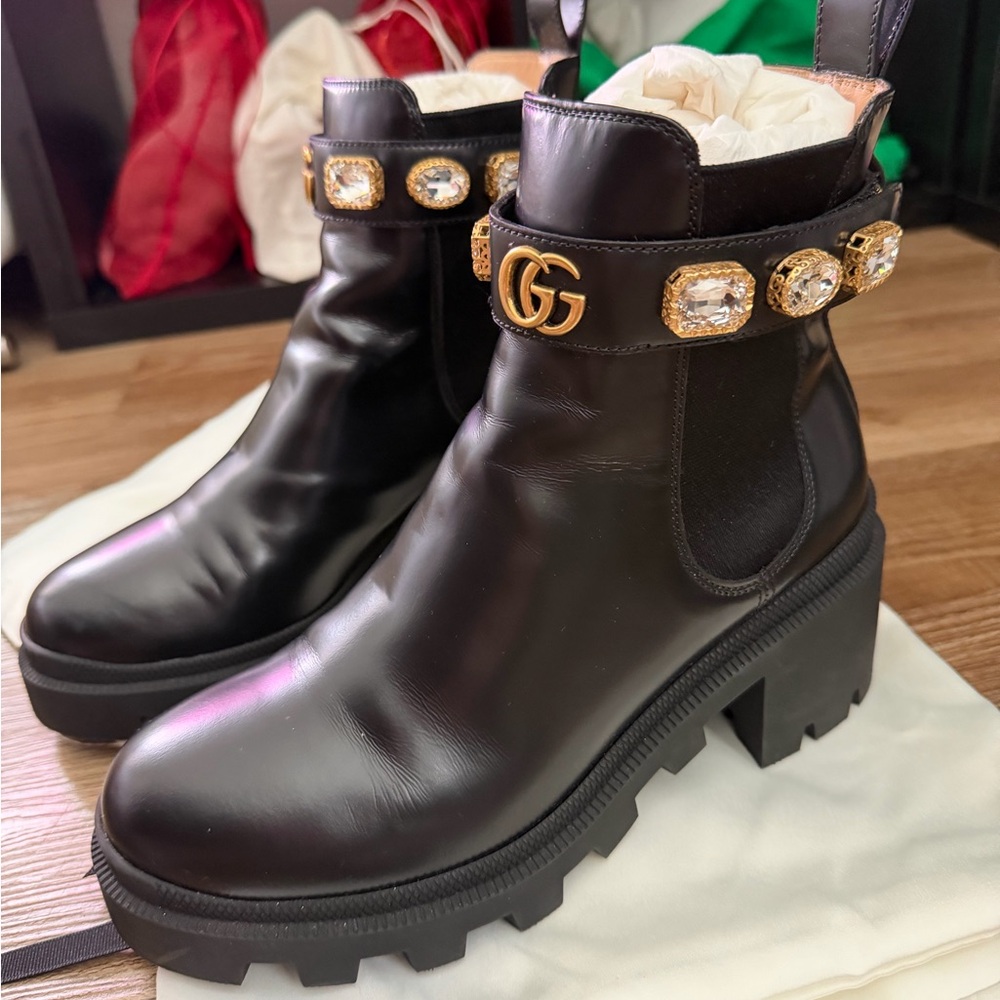 Black Leather Ankle Boots with Gold Accents